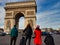 Tourists visit the Arc de Triomphe in Paris