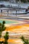 Tourists visit Grand Prismatic Spring Basin and Excelsior Geyser Crate, Yellowstone