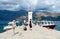Tourists visit Island of Virgin on reef Gospa od Skrpela Island in Bay of Kotor, Montenegro