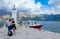 Tourists visit Island of Virgin on reef Gospa od Skrpela Island, Montenegro