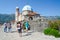 Tourists visit Island of Virgin on Reef Gospa od Skrpela Island, Montenegro