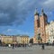 Tourists visit Krakow main square `rynek` in old town