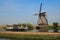 Tourists visit the  old windmill in Kinderdijk, Netherlands