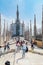 Tourists visit the roof of Milan Cathedral Duomo di Milano in summer time.