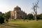 Tourists visit Shish Gumbad, also spelt Shisha Gumbad, a tomb from the last lineage of the