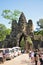 Tourists visit South gate of Angkor Thom