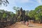 Tourists visit South gate of Angkor Thom