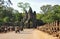 Tourists visit South gate of Angkor Thom