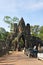 Tourists visit South gate of Angkor Thom