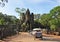 Tourists visit South gate of Angkor Thom