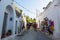 Tourists visit the town of Alberobello, famous for its trulli