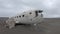 Tourists visiting abandoned wreck of a US military plane on Solheimasandur beach