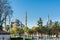 Tourists visiting Blue Mosque,  also called the Sultan Ahmed Mosque or Sultan Ahmet Mosque under sunlight in the morning in autumn