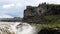 Tourists visiting Dettifoss, the most powerful waterfall in Iceland