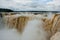 Tourists visiting the Devil s throat waterfall in the Iguazu Falls, one of the seven natural wonders of the world. Missions,