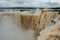 Tourists visiting the Devil s throat waterfall in the Iguazu Falls, one of the seven natural wonders of the world. Missions,