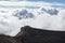 Tourists visiting Etna volcano mountain 