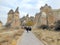 Tourists visiting historic rock formations