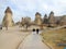 Tourists visiting historic rock formations