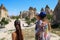 Tourists visiting monks valley and fairy chimneys, cappadocia