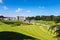 Tourists visiting Powerscourt Gardens, view on mansion from terraced lawn