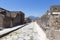 Tourists visiting the restored ruins of Pompeii city