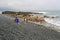 Tourists visiting rock beach of sanxiantai in cloudy day