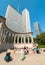 Tourists visiting Wrigley Square and Millennium Monument in Chicago downtown.