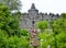 Tourists and visitors climbing steps of Borobudur