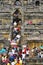Tourists and visitors climbing steps of Borobudur