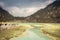 Tourists at the volcanic sulphur crater lake of Kawah Putih, Indonesia