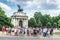 Tourists wait by the Wellington Arch, London