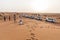 Tourists Waiting and Stop Cars for Sun Down on The Sand Dune of Dubai