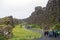 Tourists walk through the Almannagja fault line in the mid-atlantic ridge north american plate in Thingvellir National Park