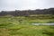 Tourists walk through the Almannagja fault line in the mid-atlantic ridge north american plate in Thingvellir National Park