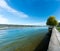 Tourists walk along the idyllic lakeshore in Steckborn on Lake Constance