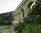 Tourists walk along the Pont du Gard is the tallest aqueduct built by the Romans in first century AD t