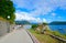 Tourists walk along promenade in Herceg Novi, Montenegro