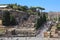 Tourists walk along the Sacred road to the Roman forum