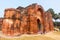 Tourists walk through the archaeological ruins of the Islamic architecture of ancient