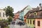 Tourists walk around the square near Roman Catholic Church - Citadel in the castle of old city. Sighisoara city in Romania