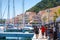 Tourists walk in Bonifacio, Corsica