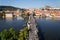 Tourists walk on Charles Bridge over Vltavar River, UNESCO World Heritage Site, Prague, Czech Republic