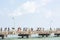 Tourists walk on the concrete bridge at Ban Phae Pier , Rayong in Thailand. January 25, 2020