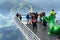 Tourists walk on Dachstein Sky Walk