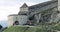 Tourists walk inside the Rasnov medieval fortified church fortress, castle, citadel.