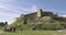 Tourists walk inside the Rasnov medieval fortified church fortress, castle, citadel.