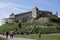 Tourists walk inside the Rasnov medieval fortified church fortress, castle, citadel