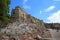 Tourists walk through the Lion`s Gate of Mycenae citadel