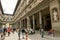 Tourists walk next to the famous Uffizi Gallery in Florence, Italy